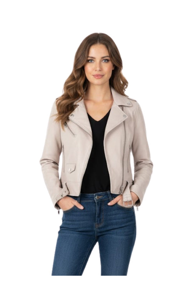 Woman wearing a beige jacket and blue jeans on a white background