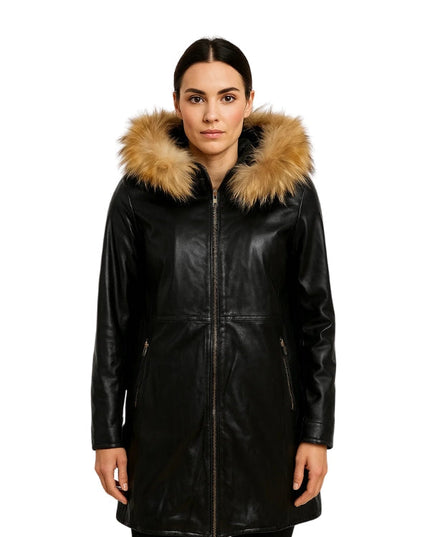 Woman wearing a black leather coat with fur hood on a white background