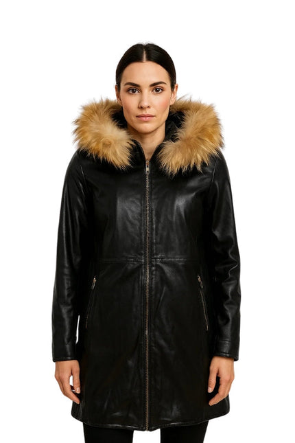 Woman wearing a black leather coat with fur hood on a white background