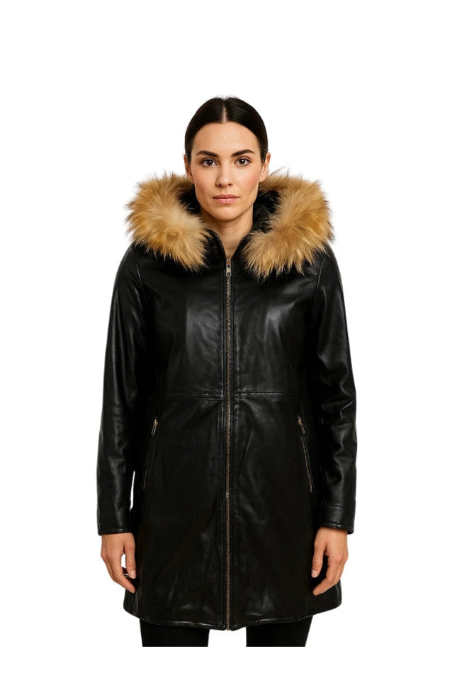 Woman wearing a black leather coat with fur hood on a white background