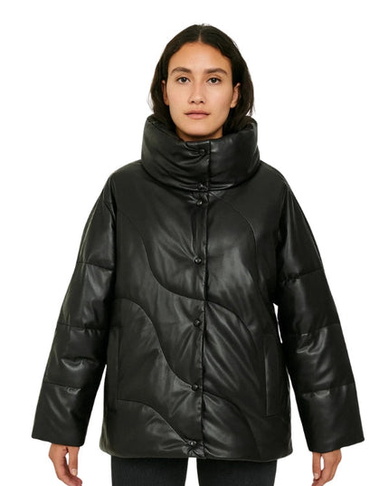 Person wearing a black puffer jacket on a white background