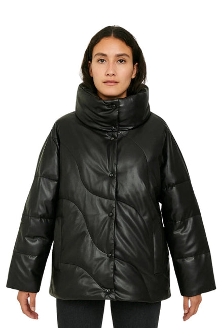 Person wearing a black puffer jacket on a white background