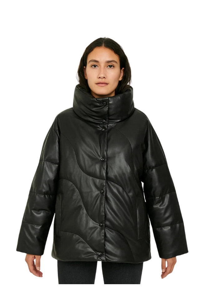 Person wearing a black puffer jacket on a white background