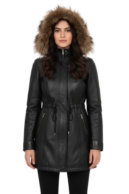 Woman wearing a black leather jacket with a fur-lined hood on a white background