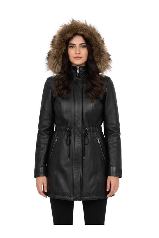 Woman wearing a black leather jacket with a fur-lined hood on a white background