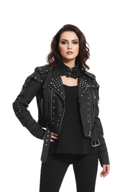Woman wearing a black studded jacket on a white background