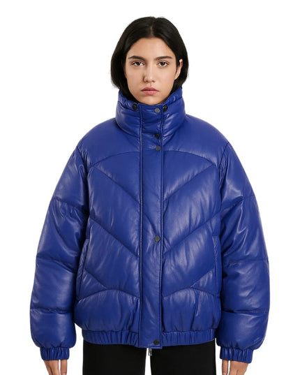 Person wearing a blue puffer jacket on a white background