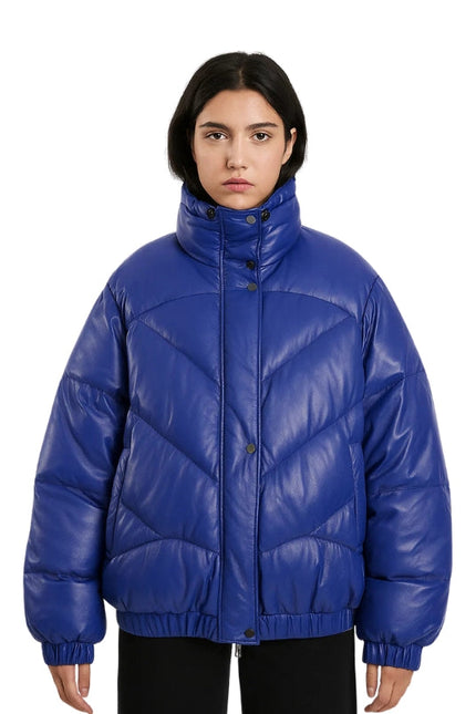 Person wearing a blue puffer jacket on a white background