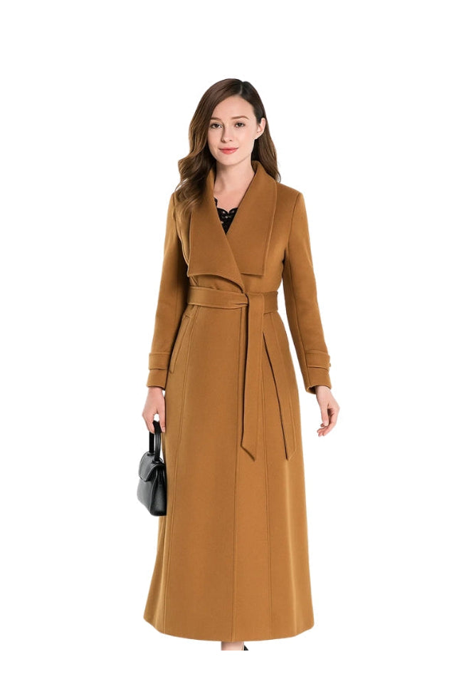 Woman wearing a long brown coat on a white background
