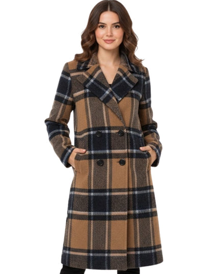 Woman wearing a plaid coat on a white background