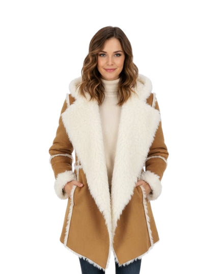 Woman wearing a tan coat with white fur trim on a white background