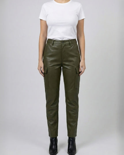 Person wearing olive green pants and a white shirt on a plain background