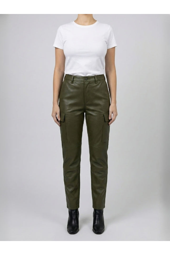 Person wearing olive green pants and a white shirt on a plain background
