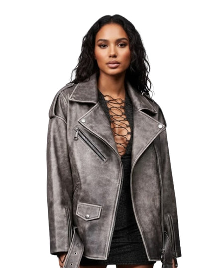 Woman wearing a gray suede jacket on a white background