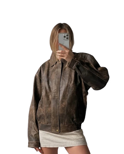 Person wearing a brown leather jacket on a white background