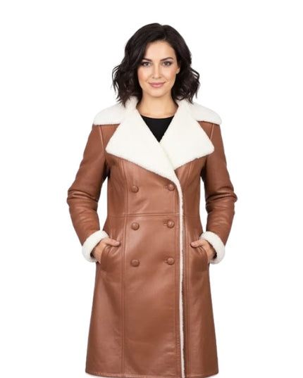 Woman wearing a brown leather coat with white fur trim on a white background
