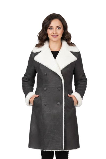 Woman wearing a gray coat with white fur trim on a white background