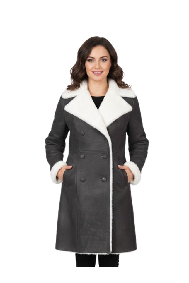 Woman wearing a gray coat with white fur trim on a white background