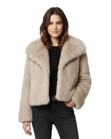 Woman wearing a beige fur jacket on a white background
