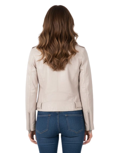 Woman wearing a beige leather jacket and blue jeans on a white background
