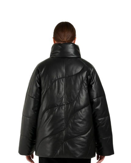 Person wearing a black leather coat on a white background