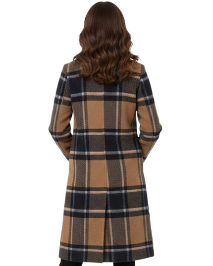 Woman wearing a plaid coat on a white background