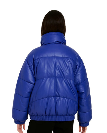 Blue puffer jacket worn by a person on a white background