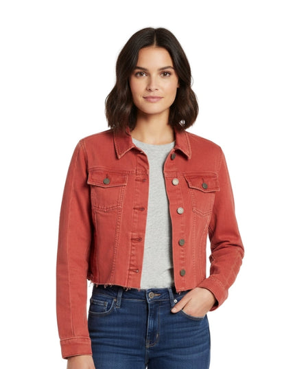 Woman wearing a red denim jacket on a white background