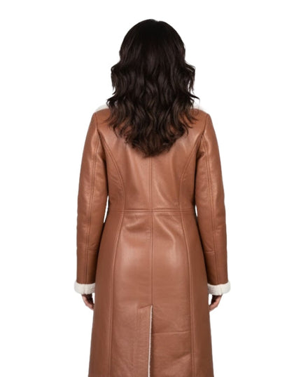 Brown leather coat worn by a person on a white background