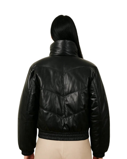 Black leather jacket worn by a person on a white background