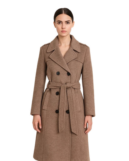 Woman wearing a brown coat on a white background