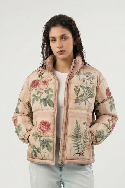Woman wearing a floral-patterned puffer jacket on a white background