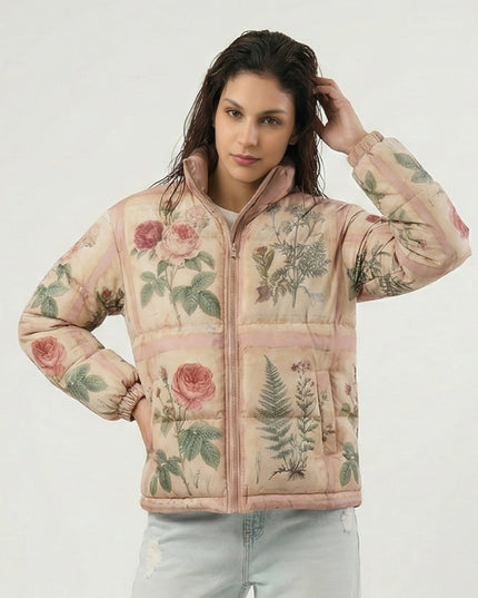 Woman wearing a floral-patterned puffer jacket on a white background