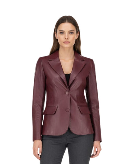 Woman wearing a burgundy leather blazer on a white background