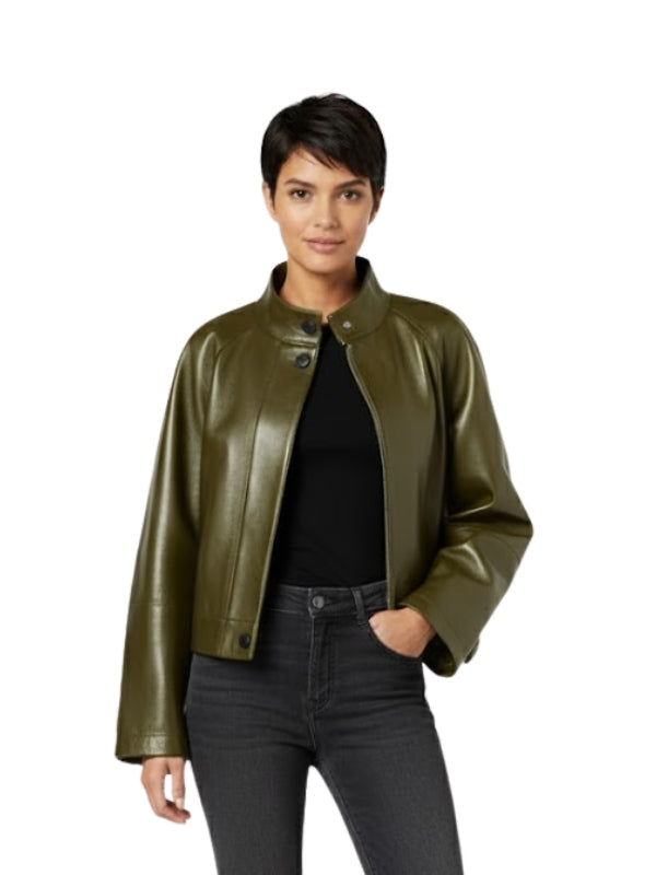 Woman wearing an olive green leather jacket on a white background