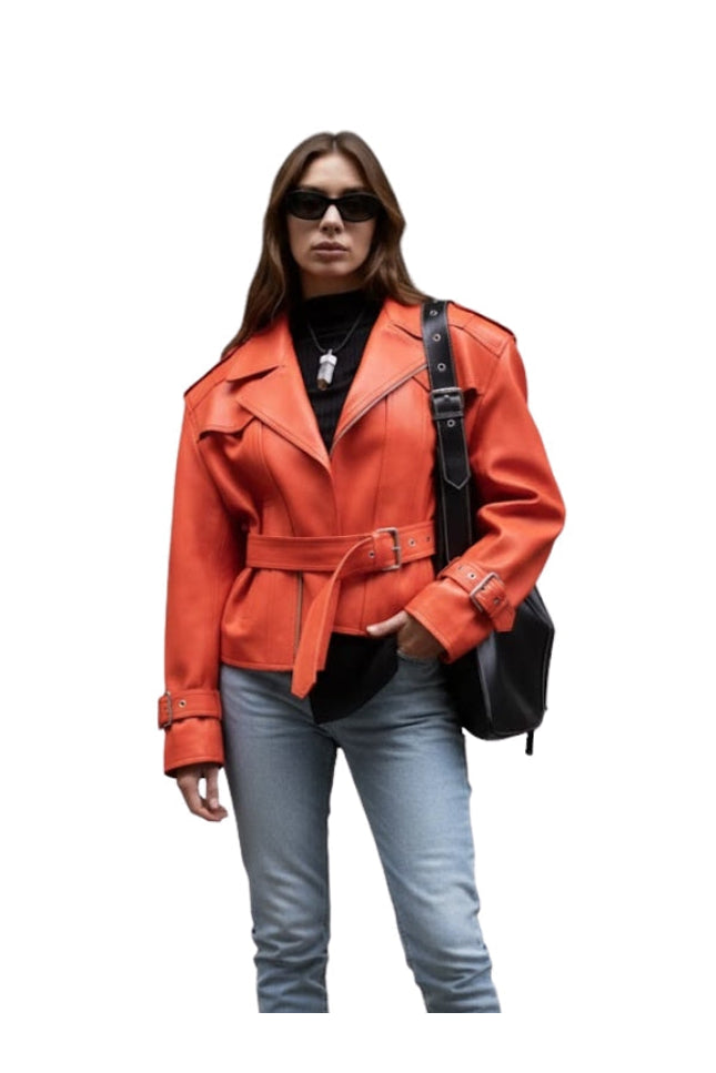 Person wearing an orange leather jacket with a black bag on a white background
