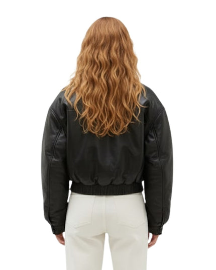 Person wearing a black leather jacket from behind on a white background