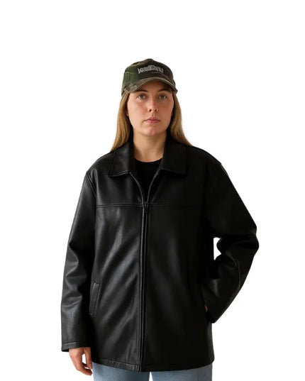 Women’s oversized black leather jacket with straight fit and classic minimalist design.