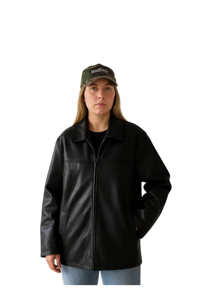 Women’s oversized black leather jacket with straight fit and classic minimalist design.