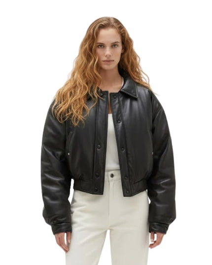 Woman wearing a black leather jacket on a white background