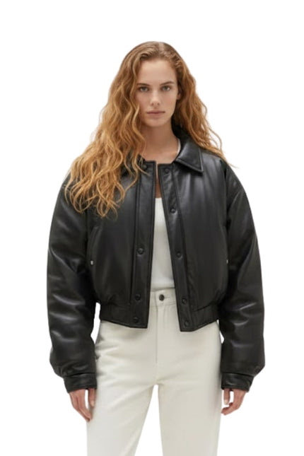 Woman wearing a black leather jacket on a white background