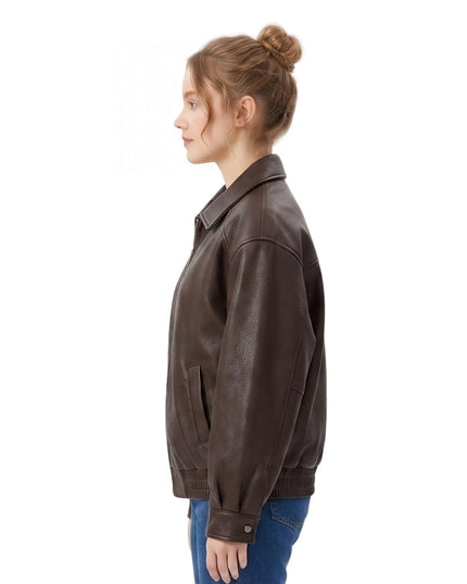 Woman wearing a brown leather jacket on a white background