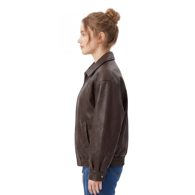 Woman wearing a brown leather jacket on a white background