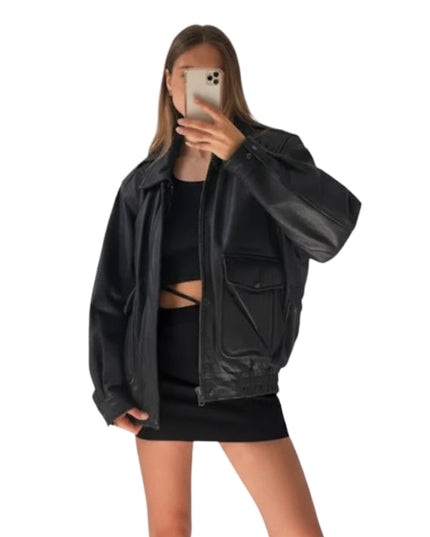 Person wearing a black leather jacket and black outfit on a white background