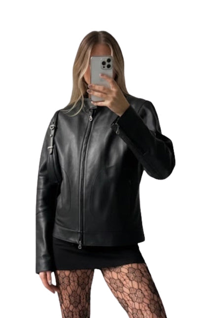 Person wearing a black leather jacket on a white background