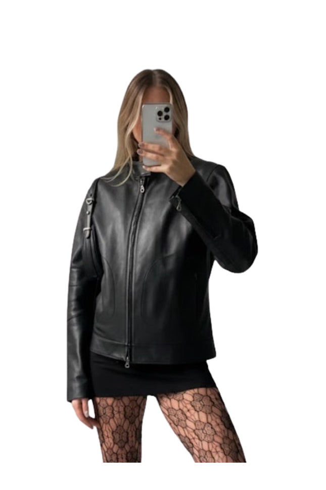 Person wearing a black leather jacket on a white background