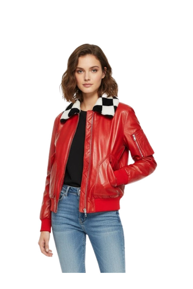 Woman wearing a red leather jacket with a checkered collar on a white background