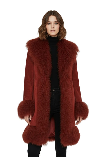 Red fur coat worn by a model on a white background