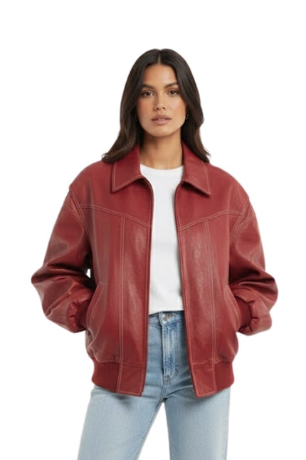 Woman wearing a red leather jacket on a white background