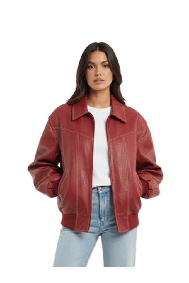 Woman wearing a red leather jacket on a white background